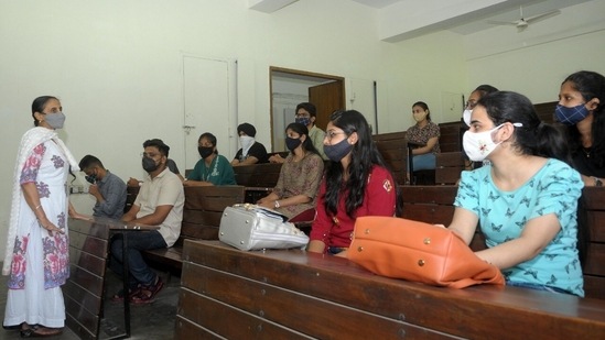Students are allowed to have their meals in the mess since the department canteen is closed.(HT Photo/Ravi Kumar)