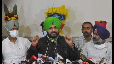 PPCC president Navjot Singh Sidhu addressing a press conference at the Punjab Congress Bhawan in Chandigarh on Wednesday (Keshav Singh/HT) PPCC president Navjot Singh Sidhu addressing a press conference at the Punjab Congress Bhawan in Chandigarh on Wednesday (Keshav Singh/HT)