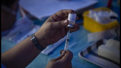 A health worker prepares to administer a dose of Covaxin during a special vaccination drive for homeless and migrant workers against Covid-19 in New Delhi, India, on Wednesday. The Joe Biden administration has been pressing the Indian government to resume exporting Covid-19 vaccines. (AP) A health worker prepares to administer a dose of Covaxin during a special vaccination drive for homeless and migrant workers against Covid-19 in New Delhi, India, on Wednesday. The Joe Biden administration has been pressing the Indian government to resume exporting Covid-19 vaccines. (AP)