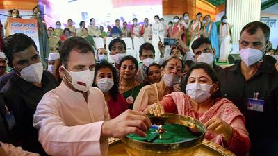 Congress MP Rahul Gandhi lights a lamp during the celebration of the 38th foundation day of Mahila Congress, in New Delhi, on Wednesday. Gandhi said the RSS and BJP are “fake Hindus” who only “use religion for their benefits”. (PTI) Congress MP Rahul Gandhi lights a lamp during the celebration of the 38th foundation day of Mahila Congress, in New Delhi, on Wednesday. Gandhi said the RSS and BJP are “fake Hindus” who only “use religion for their benefits”. (PTI)