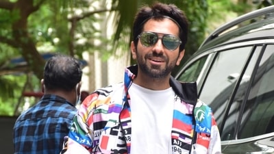 Ayushmann Khurrana was spotted at the Maddock Films office. He wore a multi-coloured jacket over a white T-shirt and off white pants. Ayushmann Khurrana was spotted at the Maddock Films office. He wore a multi-coloured jacket over a white T-shirt and off white pants.
