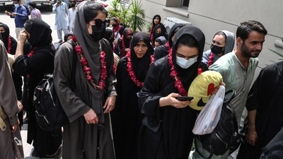 Members of Afghanistan's national women football team arrive at the Pakistan Football Federation (PFF) in Lahore. (AFP) Members of Afghanistan's national women football team arrive at the Pakistan Football Federation (PFF) in Lahore. (AFP)