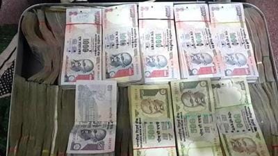 ₹15.50 lakh in cash, eight bank account passbooks, gold and silver jewellery worth ₹33.75 lakh along with land and plot related documents were recovered during the raids. (HT Photo) ₹15.50 lakh in cash, eight bank account passbooks, gold and silver jewellery worth ₹33.75 lakh along with land and plot related documents were recovered during the raids. (HT Photo)