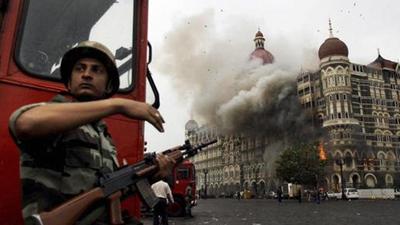 Smoke is seen billowing out of the ground and first floor of the Taj Hotel in south Mumbai during security personnel's Operation Cyclone following the 26/11 terror attacks in 2008. (File photo) Smoke is seen billowing out of the ground and first floor of the Taj Hotel in south Mumbai during security personnel's Operation Cyclone following the 26/11 terror attacks in 2008. (File photo)