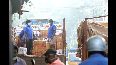 Headload workers often demand money in Kerala for unloading cargo from trucks, though the work is done by cranes or other workers. (Vivek Nair/HT Photo) Headload workers often demand money in Kerala for unloading cargo from trucks, though the work is done by cranes or other workers. (Vivek Nair/HT Photo)