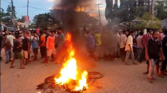 There were protests in Assam’s Silchar town on Wednesday after the body of a 16-year-old girl missing since Sunday turned up in Barak river earlier in the day. Police said two suspects have been arrested. (HT photo)
