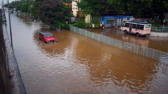A vehicle gets partially submerged in rainwater due to heavy rains in Bhubaneswar on Monday.(ANI) A vehicle gets partially submerged in rainwater due to heavy rains in Bhubaneswar on Monday.(ANI)