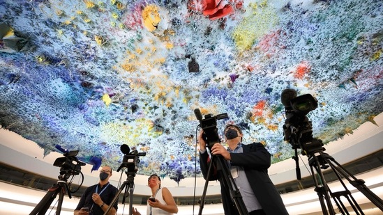 Television reporters operate during a session of the UN Human Rights Council in Geneva on Monday,(AFP)