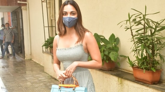 Kiara Advani was snapped outside the Dharma Productions office in Khar. She wore a long dress.
