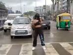 In the 30-second-long video behind the controversy, Kalra could be seen running to the Rasoma Square in Indore, wearing her face mask as she went, when the traffic signal turned red and started dancing to a song(Screenshot from original video) In the 30-second-long video behind the controversy, Kalra could be seen running to the Rasoma Square in Indore, wearing her face mask as she went, when the traffic signal turned red and started dancing to a song(Screenshot from original video)
