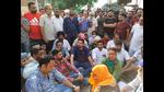 Congress MLA Angad Singh (in blue t-shirt) protesting against the SBS Nagar SSP in the district administration complex. Congress MLA Angad Singh (in blue t-shirt) protesting against the SBS Nagar SSP in the district administration complex.