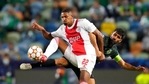 Sporting's Luis Neto, right, vies for the ball with Ajax's Sebastien Haller during a Champions League, Group C soccer match(AP) Sporting's Luis Neto, right, vies for the ball with Ajax's Sebastien Haller during a Champions League, Group C soccer match(AP)