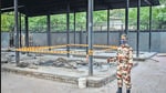 A paramilitary soldier stands guard near a pyre inside a crematorium where a 9-year-old girl from the Dalit community was cremated. Angry villagers held a protest saying the girl was raped and killed.(AP Photo) A paramilitary soldier stands guard near a pyre inside a crematorium where a 9-year-old girl from the Dalit community was cremated. Angry villagers held a protest saying the girl was raped and killed.(AP Photo)