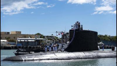 The Virginia-class fast-attack submarine USS Illinois returns home to Joint Base Pearl Harbour-Hickam from a deployment in the 7th Fleet area of responsibility on Monday. Australia decided to invest in US nuclear-powered submarines and dump its contract with France to build diesel-electric submarines because of a changed strategic environment, Prime Minister Scott Morrison said. (AP) The Virginia-class fast-attack submarine USS Illinois returns home to Joint Base Pearl Harbour-Hickam from a deployment in the 7th Fleet area of responsibility on Monday. Australia decided to invest in US nuclear-powered submarines and dump its contract with France to build diesel-electric submarines because of a changed strategic environment, Prime Minister Scott Morrison said. (AP)