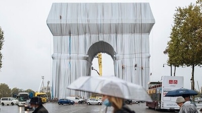 Masterpiece or monstrosity? Arc de Triomphe enveloped by Christo's artwork leaves tourists bemused (AP) Masterpiece or monstrosity? Arc de Triomphe enveloped by Christo's artwork leaves tourists bemused (AP)