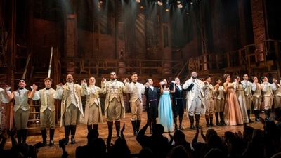 Actors greet the audience at the Richard Rogers theater during curtain call of the first return performance of ‘Hamilton’ as Broadway shows begin to re-open to live audiences after being closed for more than a year due to the outbreak of the coronavirus disease (COVID-19) in Manhattan in New York City.&nbsp; (REUTERS)