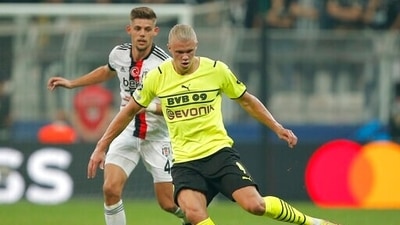 Besiktas' Francisco Montero, left, challenges for the ball with Dortmund's Erling Haaland during the Champions League Group C soccer match (AP) Besiktas' Francisco Montero, left, challenges for the ball with Dortmund's Erling Haaland during the Champions League Group C soccer match (AP)