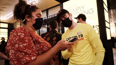 People attending the play ‘The Lion King’ show proof of vaccination at the door as numerous Broadway shows re-open on September 14 in New York City. (AFP) People attending the play ‘The Lion King’ show proof of vaccination at the door as numerous Broadway shows re-open on September 14 in New York City. (AFP)