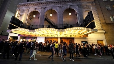 People wait to attend the Broadway musical ‘Hamilton’ after showing their vaccination cardsat the Richard Rodgers Theatre in New York, as the highest grossing Broadway musical of all time returns after being dark for 18 months due the coronavirus pandemic. (AFP) People wait to attend the Broadway musical ‘Hamilton’ after showing their vaccination cardsat the Richard Rodgers Theatre in New York, as the highest grossing Broadway musical of all time returns after being dark for 18 months due the coronavirus pandemic. (AFP)