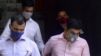 Sanjeev Palande (pink shirt) , who was working as private secretary to former home minister Anil Deshmukh, was arrested on June 26 over money laundering charges. (HT File) Sanjeev Palande (pink shirt) , who was working as private secretary to former home minister Anil Deshmukh, was arrested on June 26 over money laundering charges. (HT File)