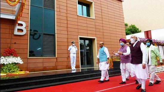 PM Modi, accompanied by defence minister Rajnath Singh and housing & urban affairs minister Hardeep Singh Puri, at the new defence office complex at KG Marg on Thursday. (ANI) PM Modi, accompanied by defence minister Rajnath Singh and housing & urban affairs minister Hardeep Singh Puri, at the new defence office complex at KG Marg on Thursday. (ANI)
