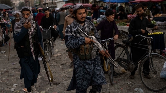 Kabul: Taliban fighters patrol a market in Kabul's Old City, Afghanistan, Tuesday, Sept. 14, 2021.(AP)