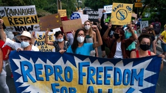 Abortion rights demonstrators march outside of Supreme Court Justice Brett Kavanaugh's home in Chevy Chase, Md.(AP) Abortion rights demonstrators march outside of Supreme Court Justice Brett Kavanaugh's home in Chevy Chase, Md.(AP)