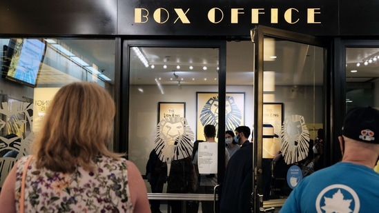 People attending the play ‘The Lion King’ arrive at the door as numerous Broadway shows re-open on September 14, 2021 in New York City. &nbsp;(AFP)