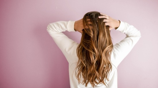 The market is filled with products that claim to benefit your hair and skin in many ways. Instead of burning a hole in your pocket, you can treat hair loss at home with these easy remedies.(Unsplash)