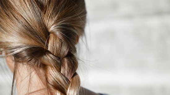 Apply onion juice: The sulphur in onions helps in the growth of new hair. Apply the juice of one onion all over your scalp and gently massage it. Leave it for an hour and rinse with lukewarm or cold water.(Unsplash)