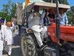 Farmers shout slogans as they make their way to Delhi to join farmers who are continuing their protest against the central government's agricultural reforms in the village Jandiala on the outskirts of Amritsar on September 15, 2021. Farmers shout slogans as they make their way to Delhi to join farmers who are continuing their protest against the central government's agricultural reforms in the village Jandiala on the outskirts of Amritsar on September 15, 2021. 