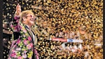 Elton John has roped in Gucci to design the costumes for his farewell tour. Suits, as always, but also a more refined palette of prints and pigments will be evident at his concerts. (Rocketman Entertainment) Elton John has roped in Gucci to design the costumes for his farewell tour. Suits, as always, but also a more refined palette of prints and pigments will be evident at his concerts. (Rocketman Entertainment)