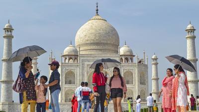 Tourists visit the Taj Mahal in Agra. There is a pressing need to upgrade capacity at top tourist locations, while simultaneously developing alternate tourist destinations to take the load off. (Representational image/PTI) Tourists visit the Taj Mahal in Agra. There is a pressing need to upgrade capacity at top tourist locations, while simultaneously developing alternate tourist destinations to take the load off. (Representational image/PTI)