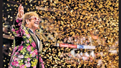 Elton John has roped in Gucci to design the costumes for his farewell tour. Suits, as always, but also a more refined palette of prints and pigments will be evident at his concerts. (Rocketman Entertainment) Elton John has roped in Gucci to design the costumes for his farewell tour. Suits, as always, but also a more refined palette of prints and pigments will be evident at his concerts. (Rocketman Entertainment)