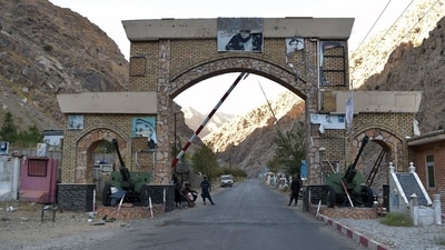 Taliban fighters stand guard at the entrance gate of Panjshir Province, (AFP) Taliban fighters stand guard at the entrance gate of Panjshir Province, (AFP)