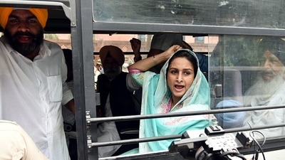 Shiromani Akali Dal leader Harsimrat Kaur and others detained by police personnel as they protest against the three farm laws, in New Delhi on September 17. (ANI) Shiromani Akali Dal leader Harsimrat Kaur and others detained by police personnel as they protest against the three farm laws, in New Delhi on September 17. (ANI)