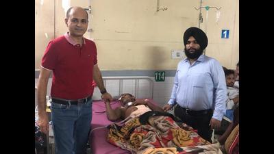 Dr Varun Saggar with the patient in Ludhiana on Friday. (HT Photo)