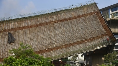 Officials said a preliminary report suggested the workers, aged between 21-49 years, were carrying out some work on the girder when it collapsed. (Vijay Bate/HT Photo) Officials said a preliminary report suggested the workers, aged between 21-49 years, were carrying out some work on the girder when it collapsed. (Vijay Bate/HT Photo)