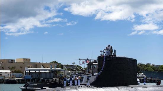 The Virginia-class fast-attack submarine USS Illinois returns home to Joint Base Pearl Harbour-Hickam from a deployment in the 7th Fleet area of responsibility. (AP)