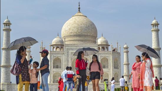 Tourists visit the Taj Mahal in Agra. There is a pressing need to upgrade capacity at top tourist locations, while simultaneously developing alternate tourist destinations to take the load off. (Representational image/PTI)