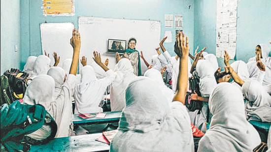 Students in a Hyderabad classroom talk to Ruth Sequeira, a top human resources professional who is one of the 15 women profiled in Varsha Adusumilli’s book, Wonder Girls (Wonder Girls Foundation Programme)