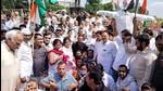 Congress workers staging a demonstration against the BJP at Rohtak on Saturday. (Manoj Dhaka/HT) Congress workers staging a demonstration against the BJP at Rohtak on Saturday. (Manoj Dhaka/HT)