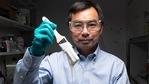 Xiulin Ruan, a Purdue University professor of mechanical engineering, and his students have created the whitest paint in the world. (Purdue University photo/John Underwood) Xiulin Ruan, a Purdue University professor of mechanical engineering, and his students have created the whitest paint in the world. (Purdue University photo/John Underwood)