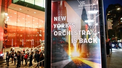 People wait in line to attend the New York Philharmonic's first concert after its reopening at the Alice Tully Hall in New York, on September 17. The pandemic forced the famed symphony orchestra to cancel its 2020-21 season, resulting in more than $21 million in lost ticket revenues, AFP reported. (kena Betancur / AFP)