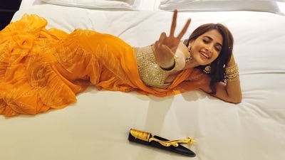 Pooja Hedge goes bold and sassy in ₹48k poppy mango leaf print ruffle saree (Instagram/hegdepooja) Pooja Hedge goes bold and sassy in ₹48k poppy mango leaf print ruffle saree (Instagram/hegdepooja)