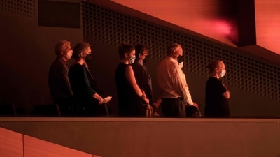 Audience members wear face masks as they attend the New York Philharmonic's first concert after its reopening at the Alice Tully Hall in New York, on September 17. On top of the challenges presented by Covid, the Phil is homeless: the orchestra's longtime base, David Geffen Hall at Lincoln Center, is in the middle of a major $550-million renovation, AFP reported. (Kena Betancur / AFP)
