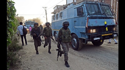 Security personnel lay a cordon near the encounter site at Noorbagh in Srinagar on Saturday. (ANI)