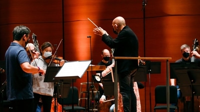 Jaap van Zweden of the New York Philharmonic directs rehearsal at the Alice Tully Hall in New York, on September 17. The conductor spent much of the pandemic in his home country of the Netherlands with his family, and cited shifting work-life balance priorities in announcing his decision. (Kena Betancur / AFP)