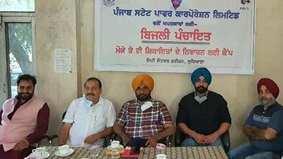 PSPCL officials resolving complaints at the consumer grievance redressal camp at the Central Division in Ludhiana on Saturday. (HT Photo)
