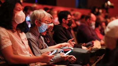 Audience members wear face masks as they attend the New York Philharmonic's first concert after its reopening at the Alice Tully Hall in New York, on September 17. "We play 130, 140 concerts a year, and you never take it for granted, but sometimes you think, 'Oh, I'm a little tired today, I've got to play this again', but not anymore -- I feel really such gratitude," the orchestra's principal trumpet player Chris Martin told AFP. (Kena Betancur / AFP)